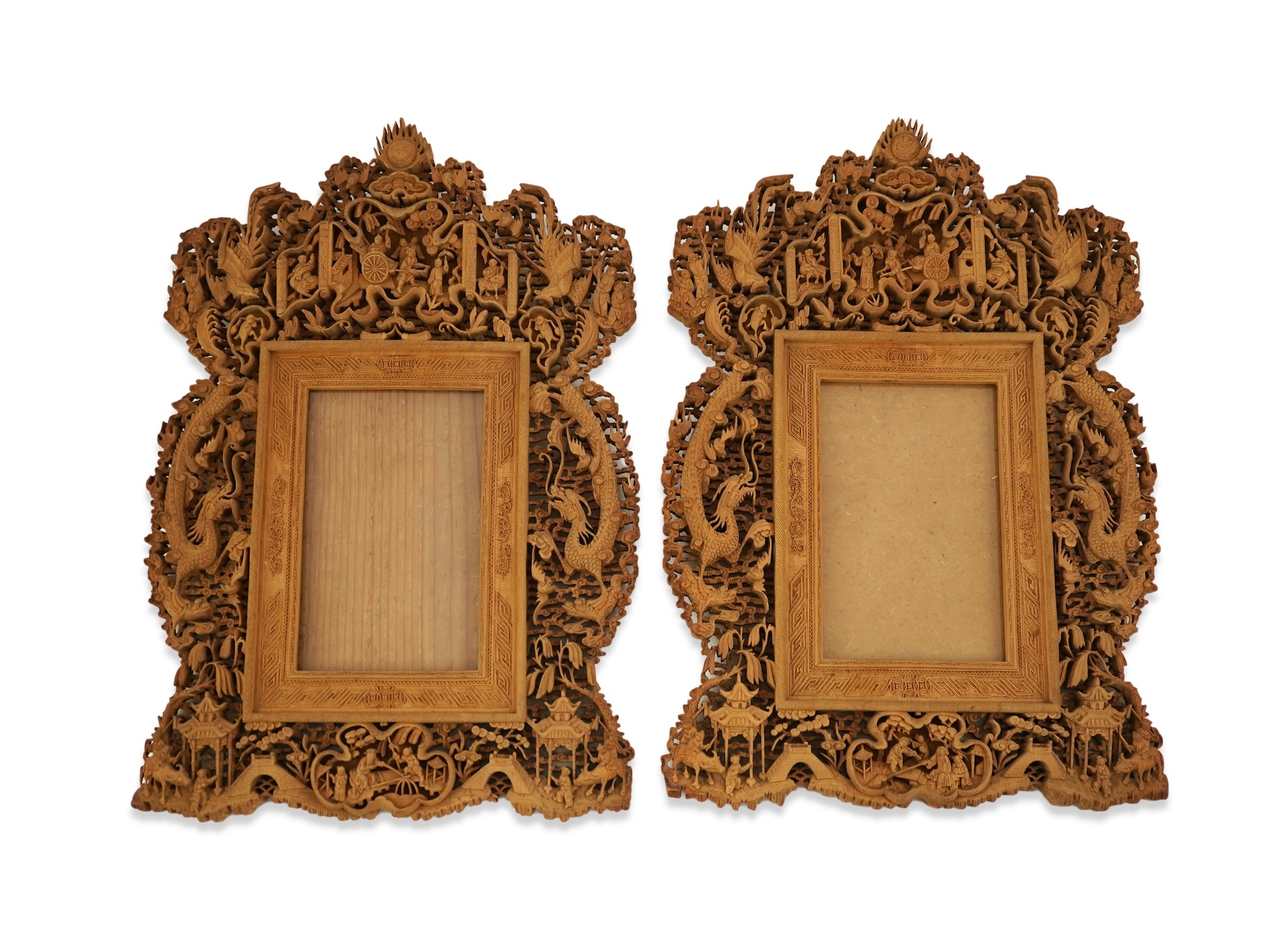 A pair of Chinese carved sandalwood frames, late 19th century